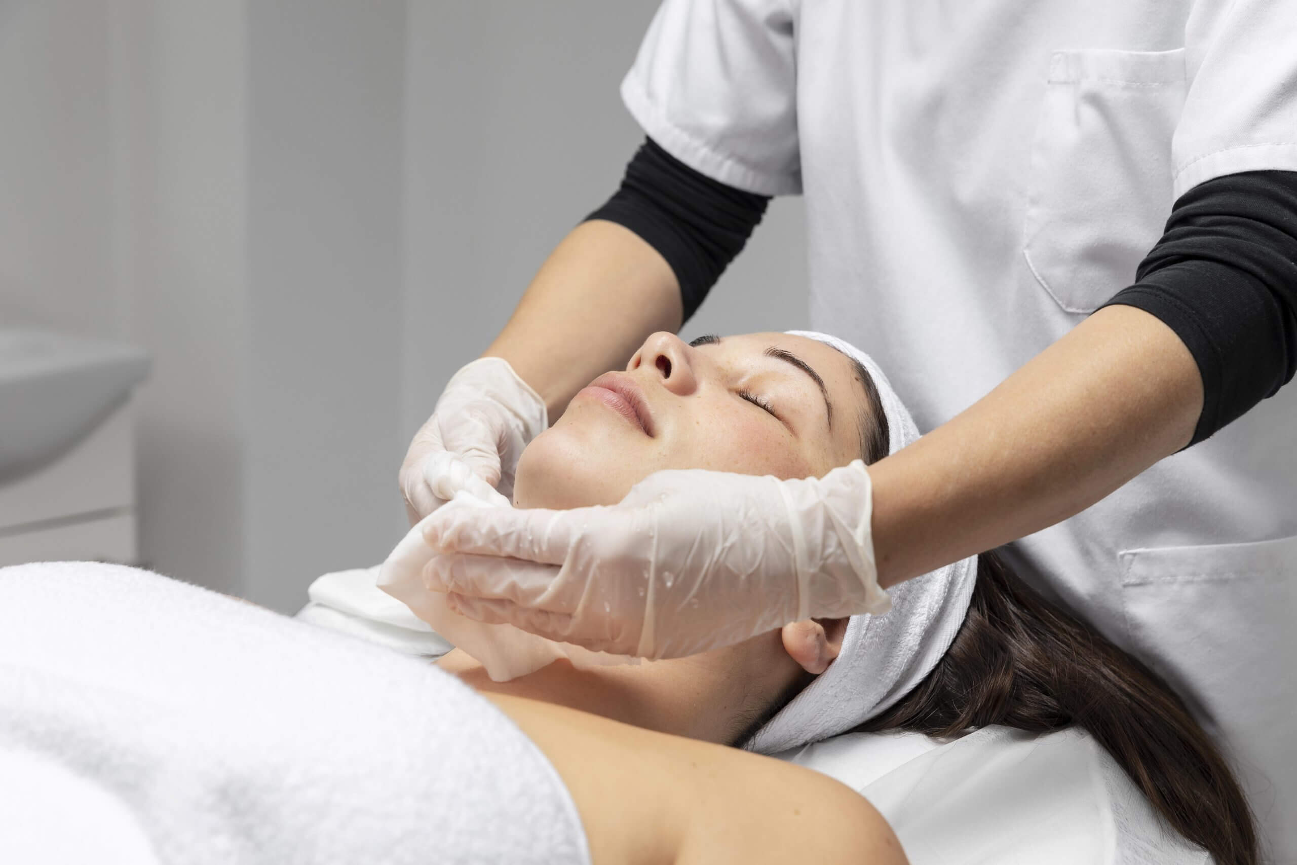 young-woman-having-facial-skincare-treatment